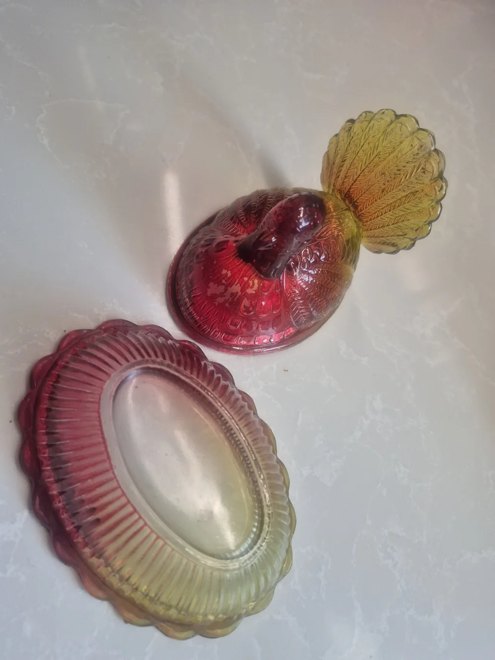Hen On Basket. Carnival Glass Decorative Dish in Amber to Ruby Iridescent